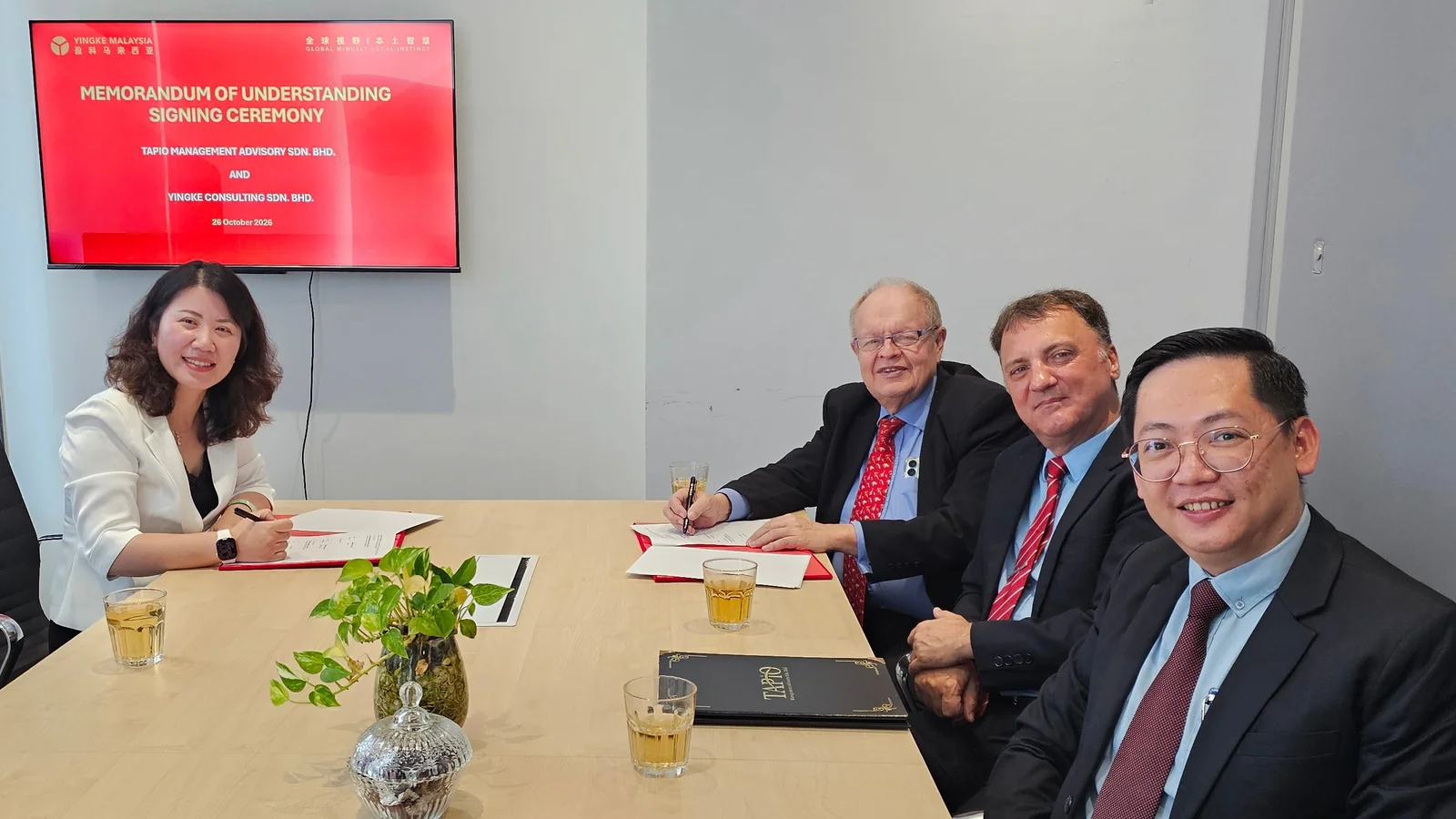 Maggie Yao, Bernhard Schutte, Thomas Bernthaler and Tan Heng Siang at the TAPiO and Yingke Malaysia MoU signing