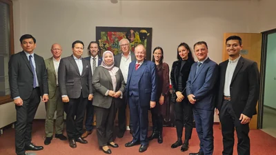 Delegation participants and Malaysian counterparts at a business meeting