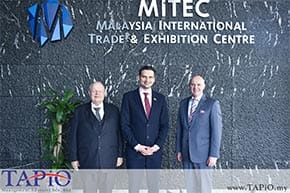 diplomat having a picture in front of company's name